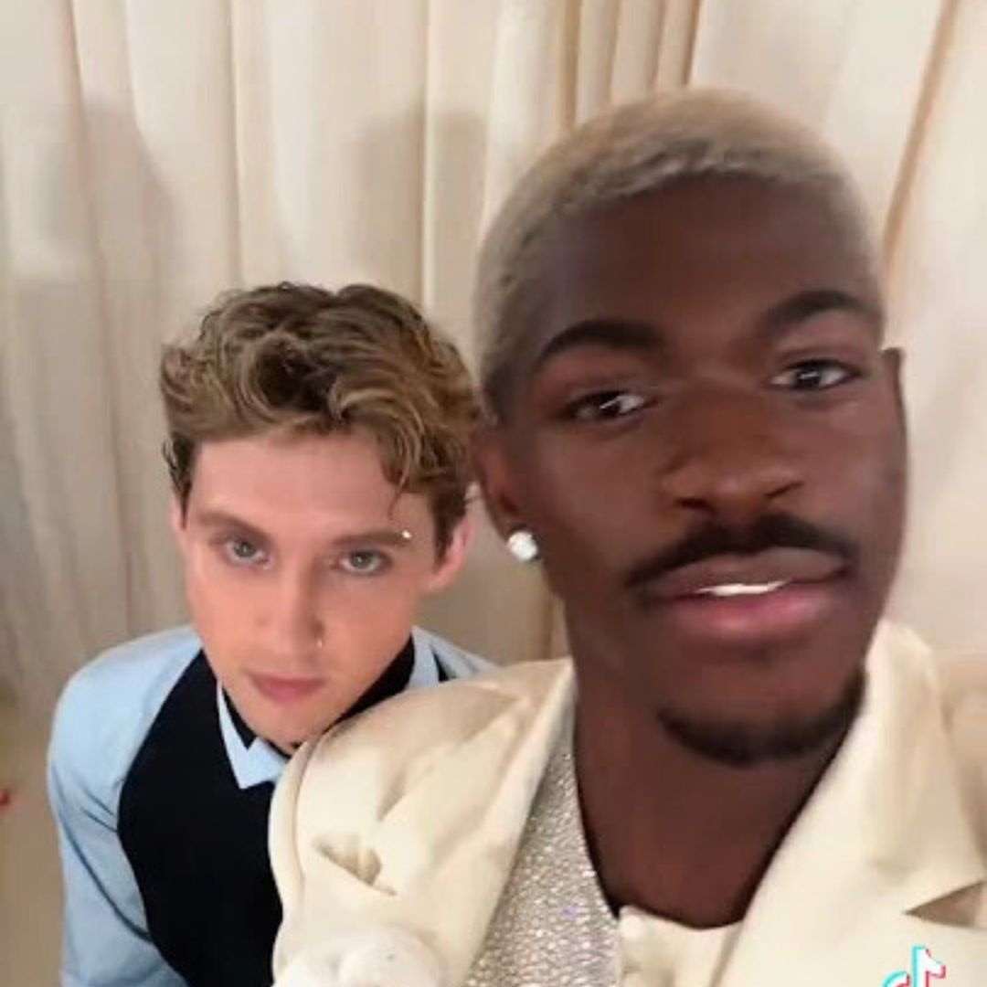 Troye Sivan and Lil Nas X hanging out at an awards show. Instagram: @lilnasx @troyesivan